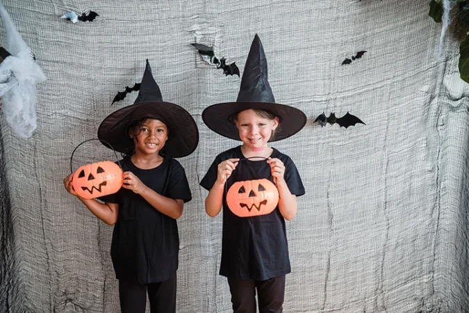 children dressed for halloween